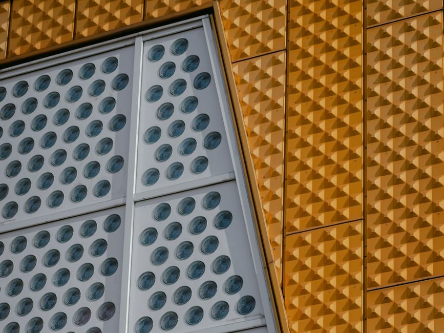 gray and orange walls of modern building